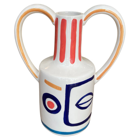 Ceramic vase with abstract design on a white background