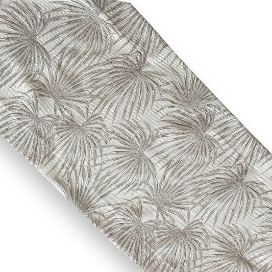 A fabric with a beige and grey tropical palm leaf pattern.