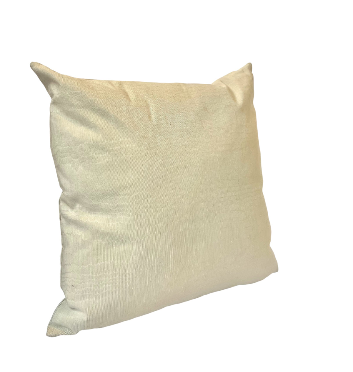 A beige satin pillow with a smooth texture.