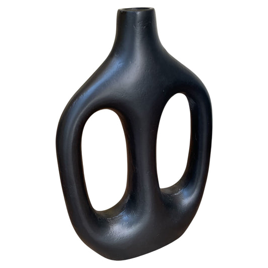 Black abstract vase on a white background