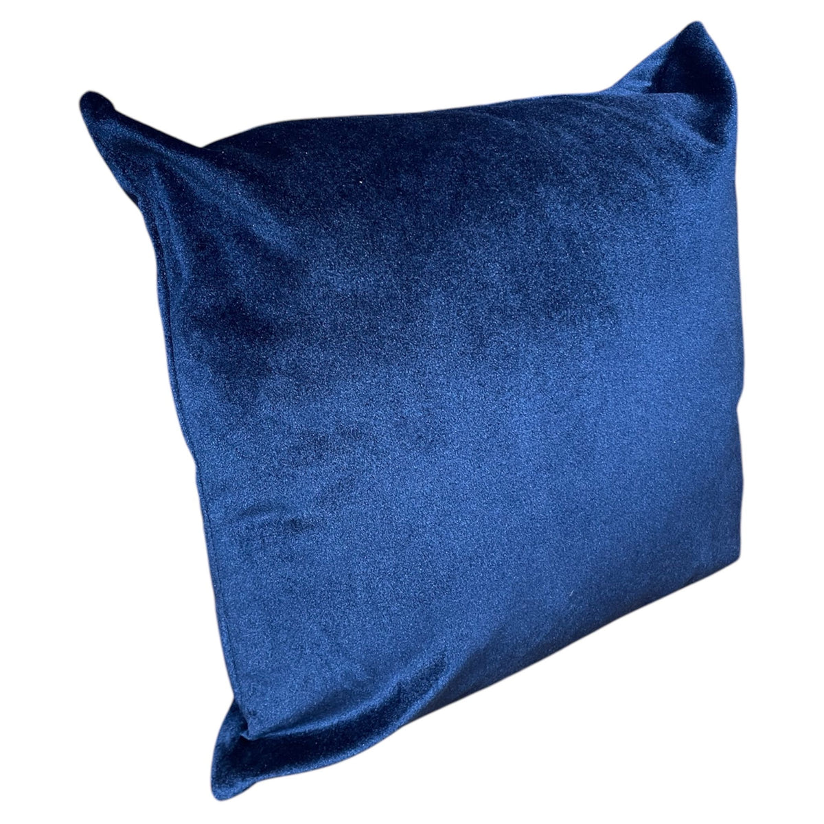 A blue square pillow with a plush texture.