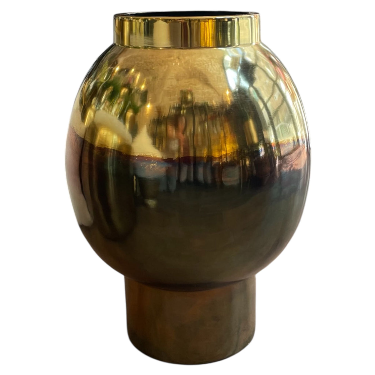 Gold metallic vase on a white background