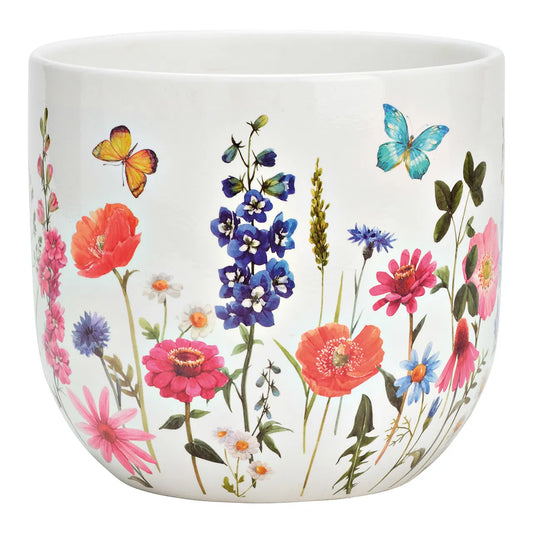 A ceramic flower pot with a white background decorated with colorful floral patterns and butterflies.