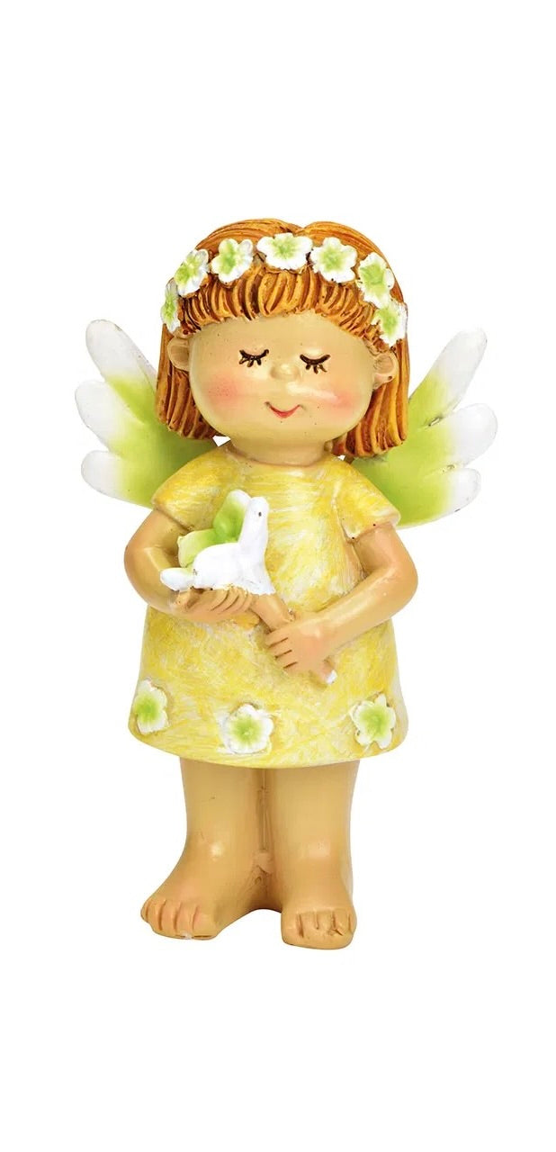 ceramic figurines of fairy,  in a green dress with a white/grreen flower.