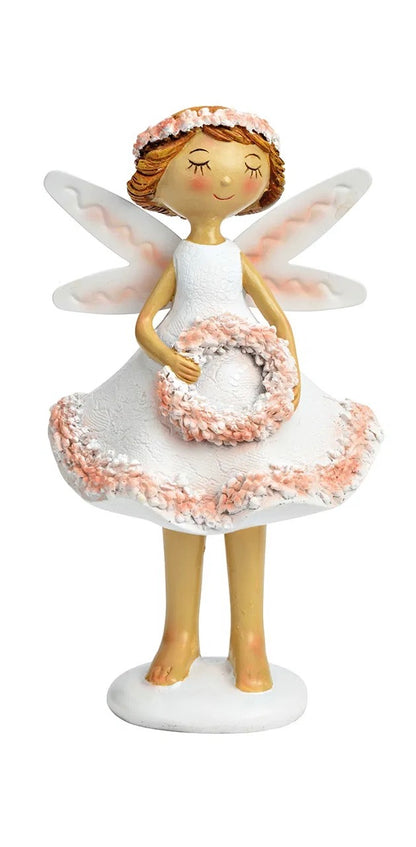 ceramic figurine of fairy in white and pink colors, holding a small floral wreath.