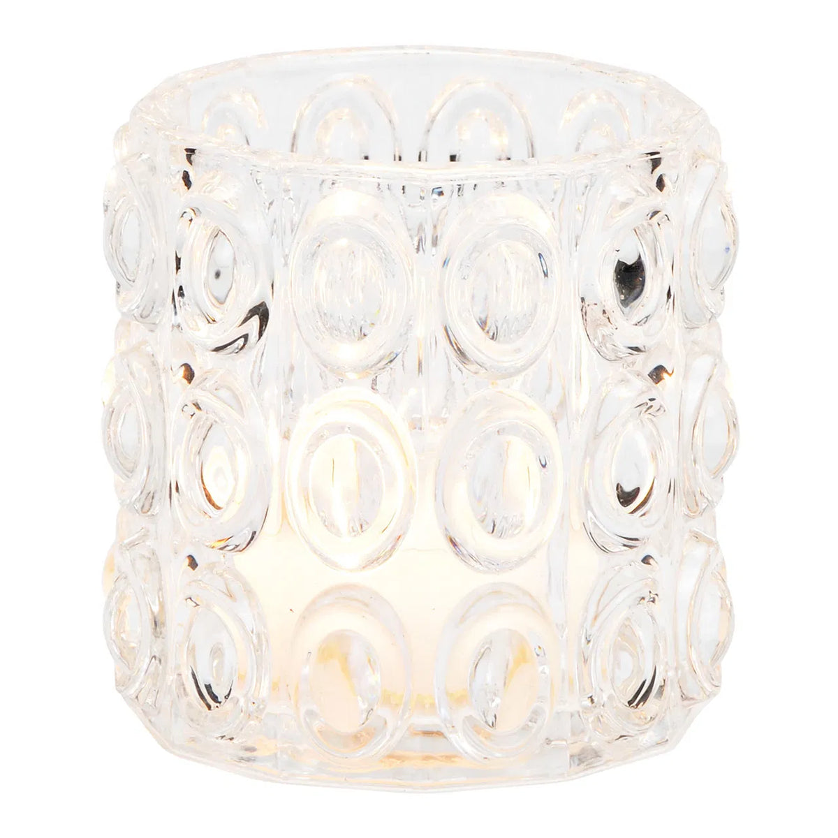 A clear glass windlight with a geometric pattern, intended for holding a candle to provide illumination.