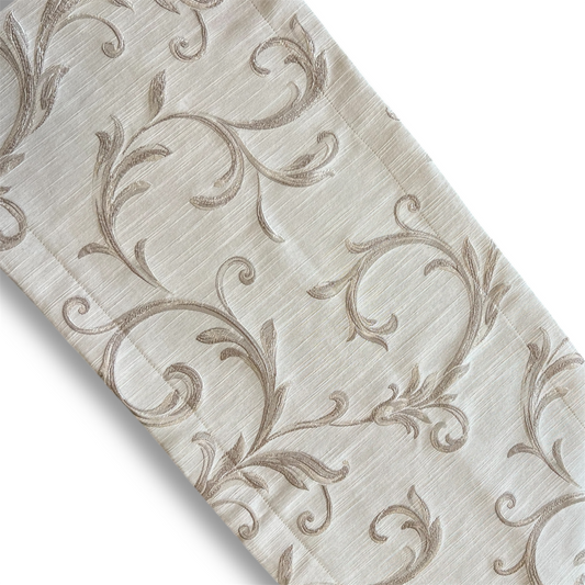 Golden Floral - White Runner features a light-beige, linen-like fabric with swirling-vine and leaf embroidery in a darker beige, offering an elegant decorative touch.