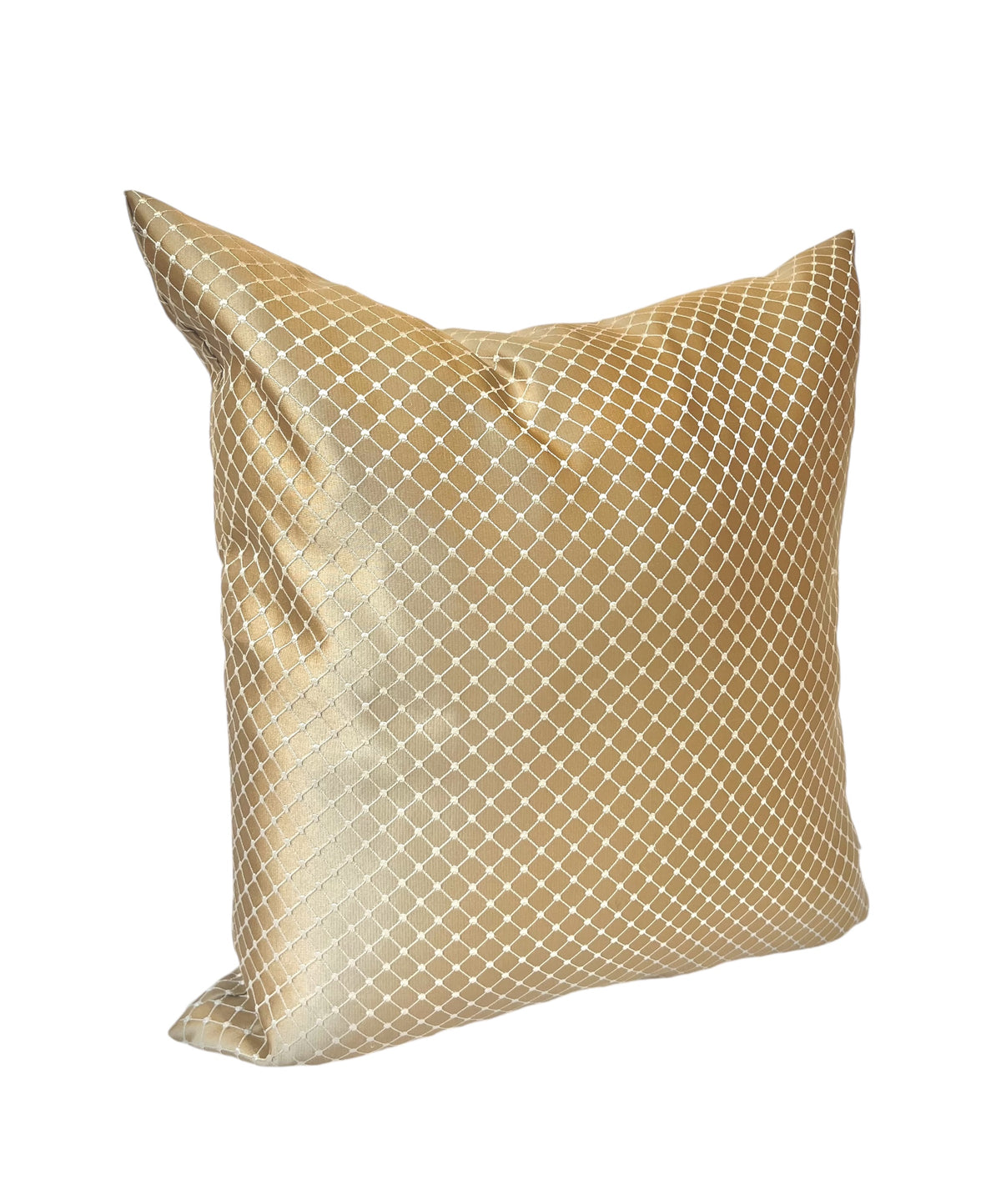 A golden square throw pillow with a geometric pattern.