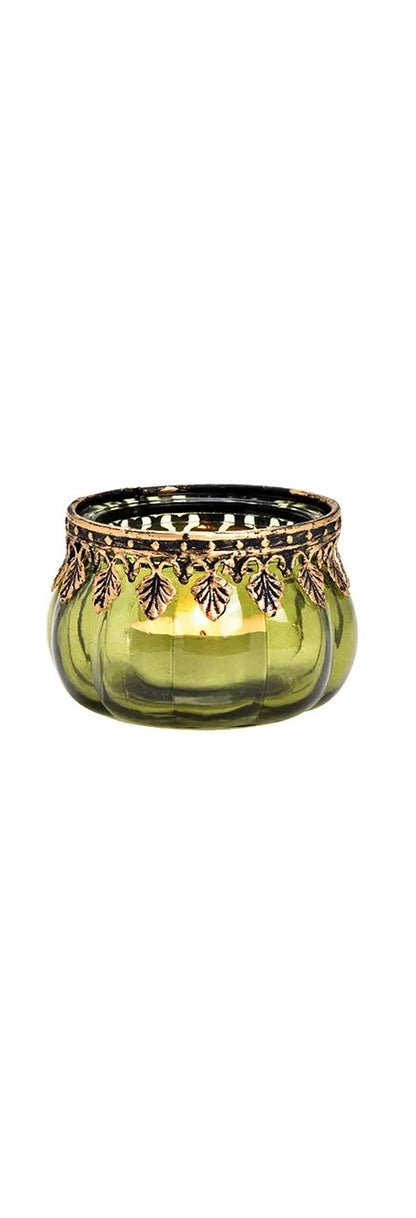 one green glass candle holder with metal decoration, displayed against a white background.