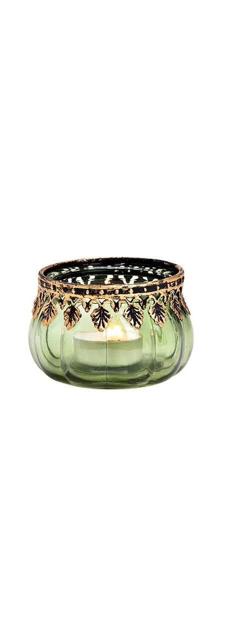 one green glass candle holder with metal decoration, displayed against a white background.