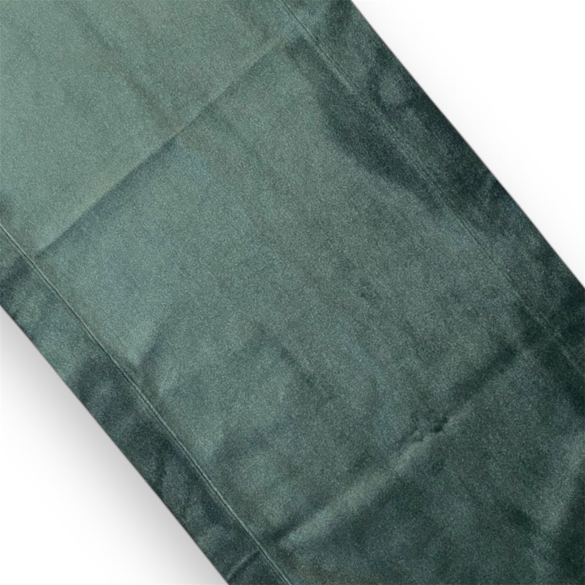 A green satin runner fabric with a smooth texture.
