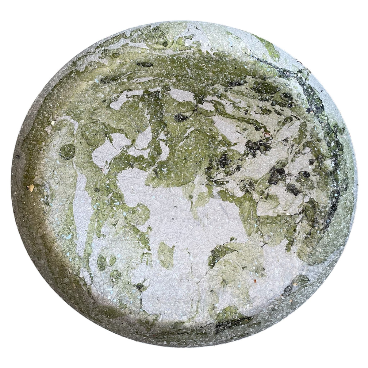 Round stone with green and white marbled pattern on a white background
