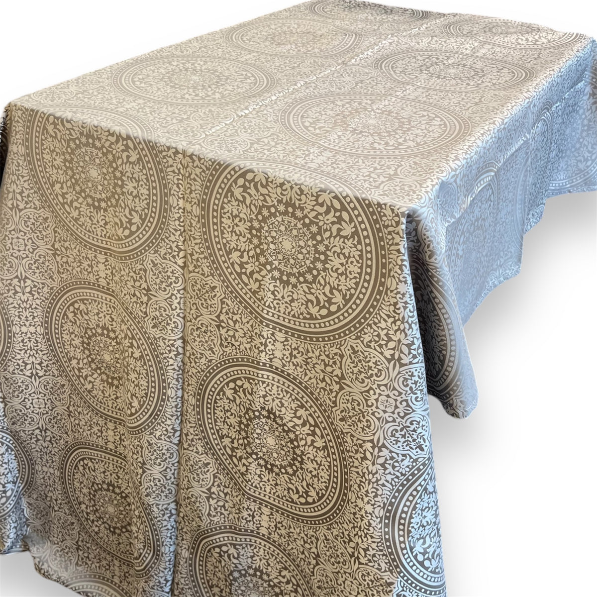 Rectangular grey and beige tablecloth featuring a large circular mandala medallion pattern draped over a table against a white background.