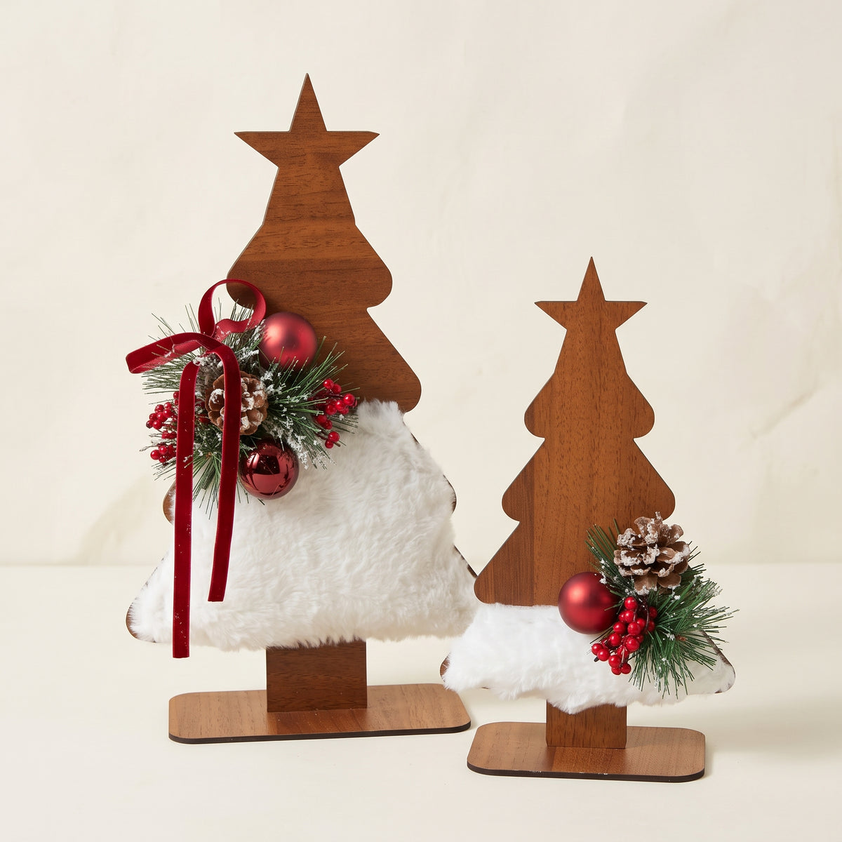 Handmade wooden star Christmas tree set, against a white background