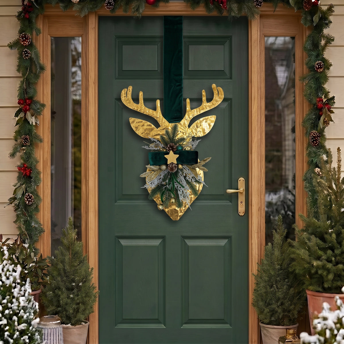Handcrafted two-sided golden deer holiday door hanger featuring a festive red plaid tartan ribbon, frosted pine branches, pinecones, berries, and a golden bell, hanging on a classic green front door