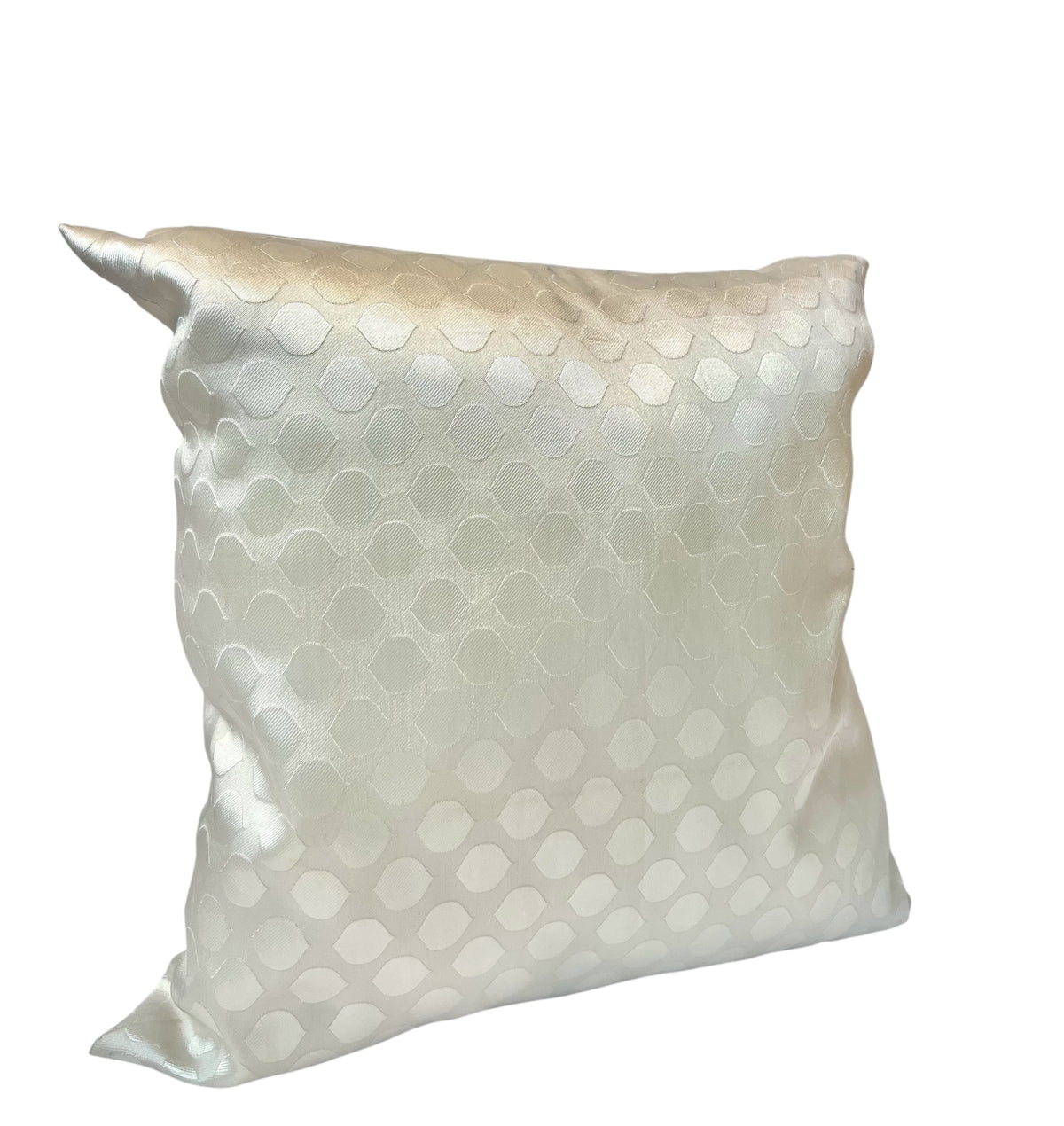 Ivory satin throw pillow featuring a subtle geometric pattern against a plain white background.