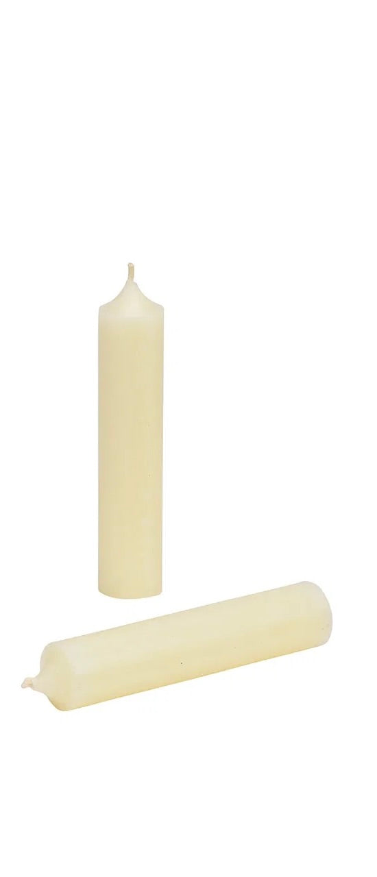 Vibrant Ivory wax taper candle standing upright against a white background.