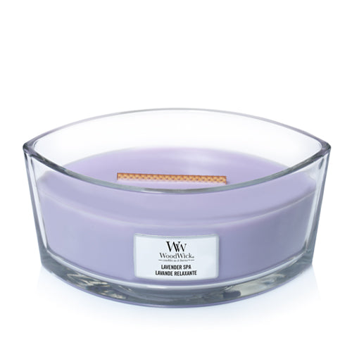 WoodWick Lavender Spa ellipse candle in a clear glass jar with an open lid.