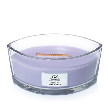 WoodWick Lavender Spa ellipse candle in a clear glass jar with an open lid.