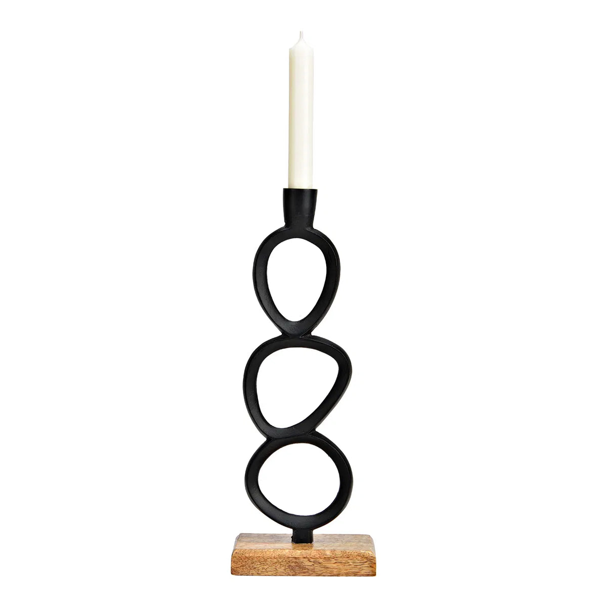 A black metal candlestick with a circular design, standing on a wooden base, with a white candle placed on top.