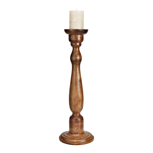 Tall rustic brown mango wood pillar candle holder with a turned, contoured spindle stem on a solid base.