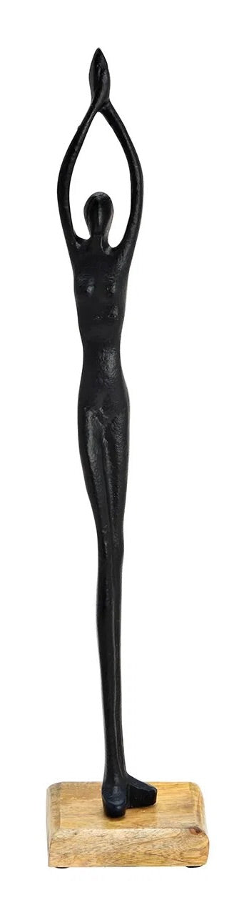 black metal human stand figures posed on wooden base