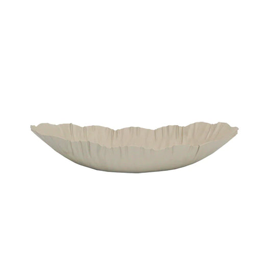 Beige decorative bowl with scalloped edge on a white background