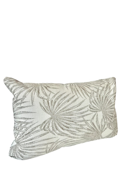 A rectangular throw pillow with a tropical gray palm leaf pattern on a white background.