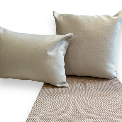 Rectangular and a square geometric pattern pillow with thier runner
