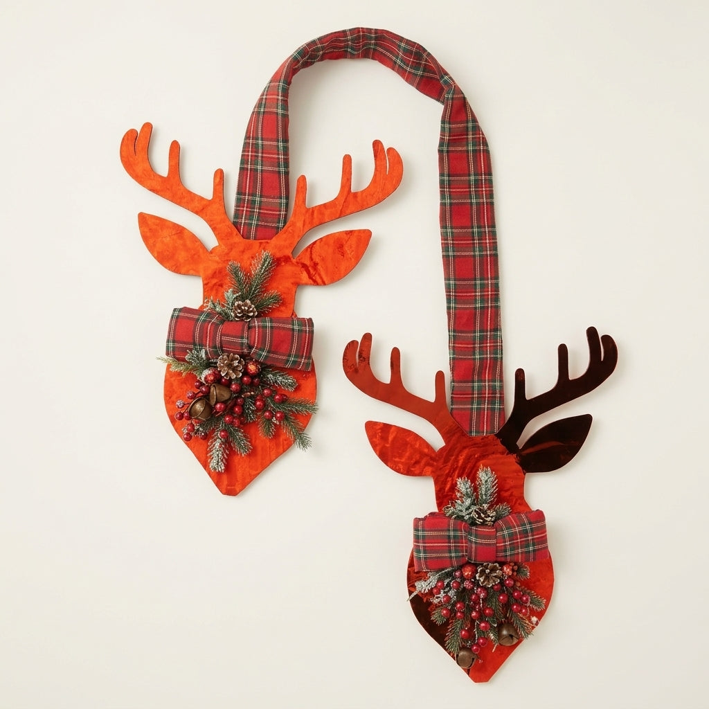 Red metallic deer hanger against white off background