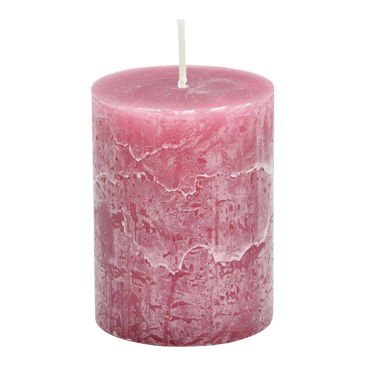 A cylindrical pink wax candle with a textured surface, lit at the top, against a white background.