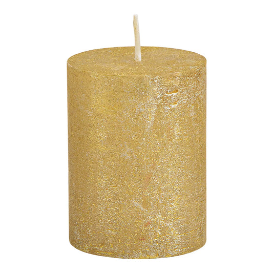 A gold-colored candle with a shimmer finish, likely made from wax.