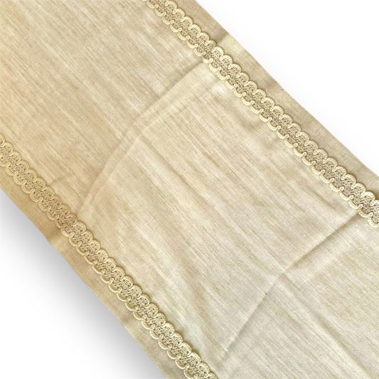 A beige lace runner with a scalloped edge and a smooth texture.