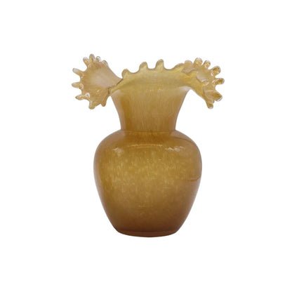 Decorative vase with shell-like top on a white background