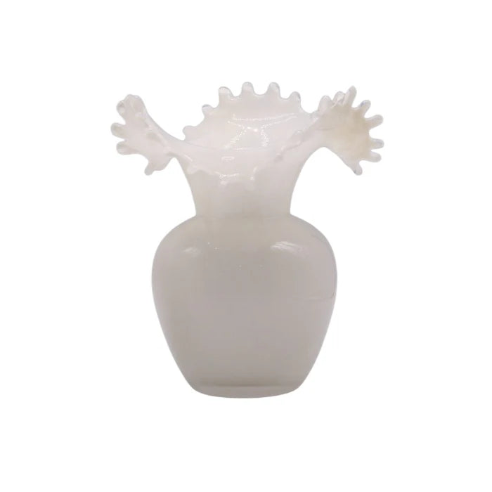 White vase with unique design on a white background