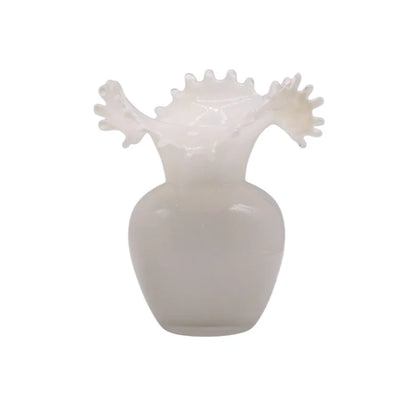 White vase with unique design on a white background