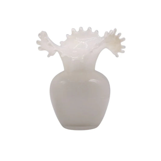 White vase with unique design on a white background