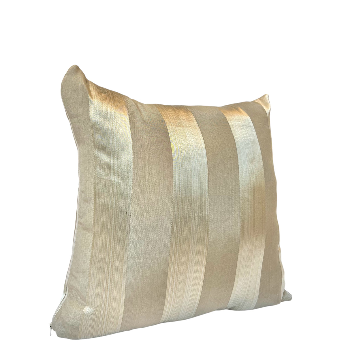 A square throw pillow with silver and golden stripes on a white background.