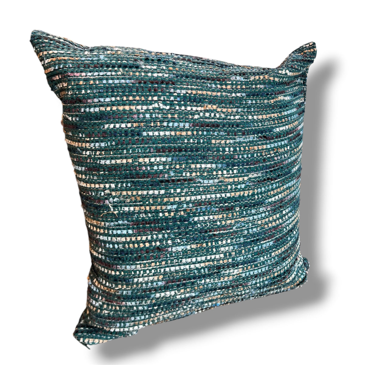 Square decorative throw pillow in a rich textured tweed weave featuring shades of ocean teal, emerald green, navy, and metallic silver threads against a plain white background.