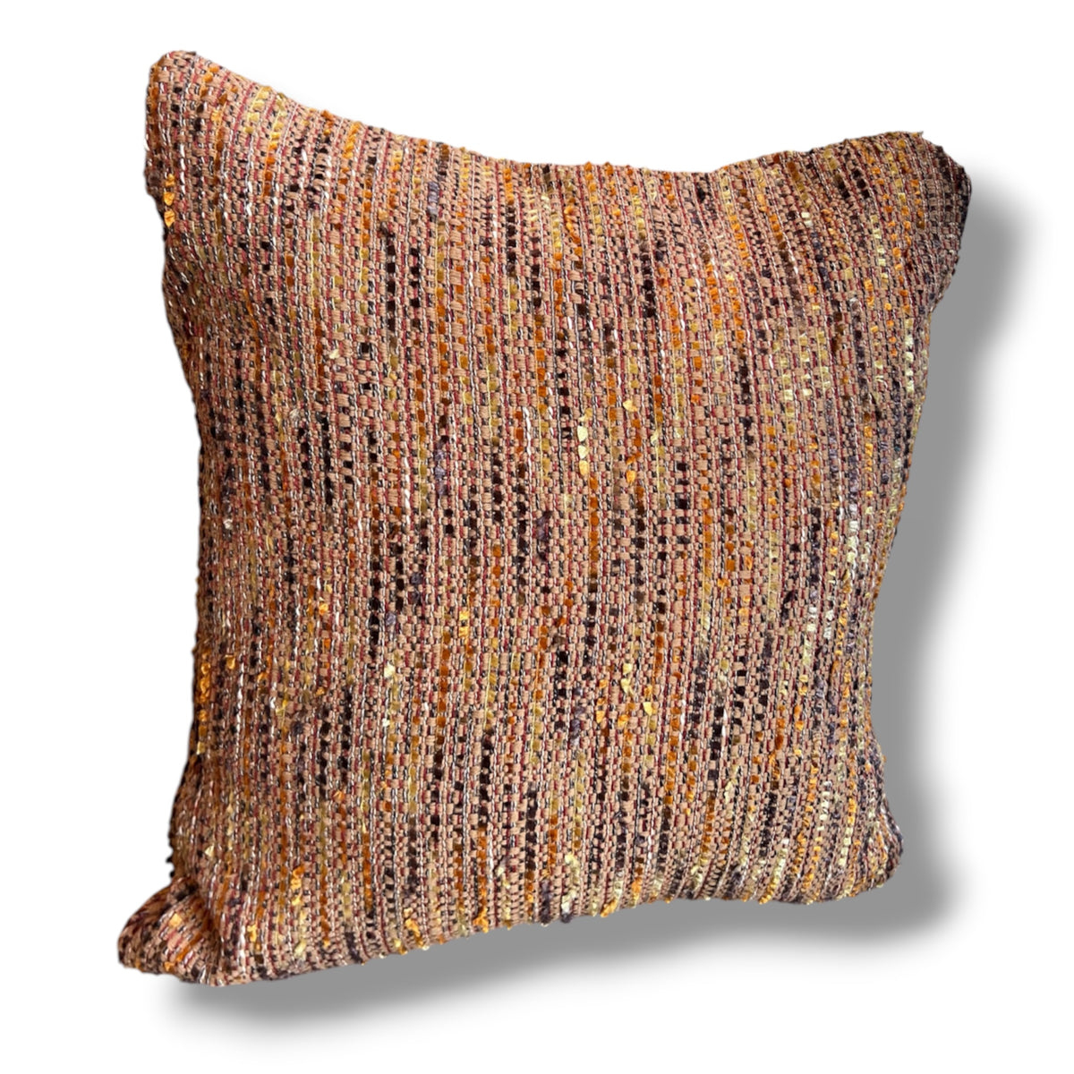 Square decorative throw pillow in a rich, multi-colored tweed weave featuring woven threads of terracotta, ochre yellow, brown, and soft purple against a plain white background.