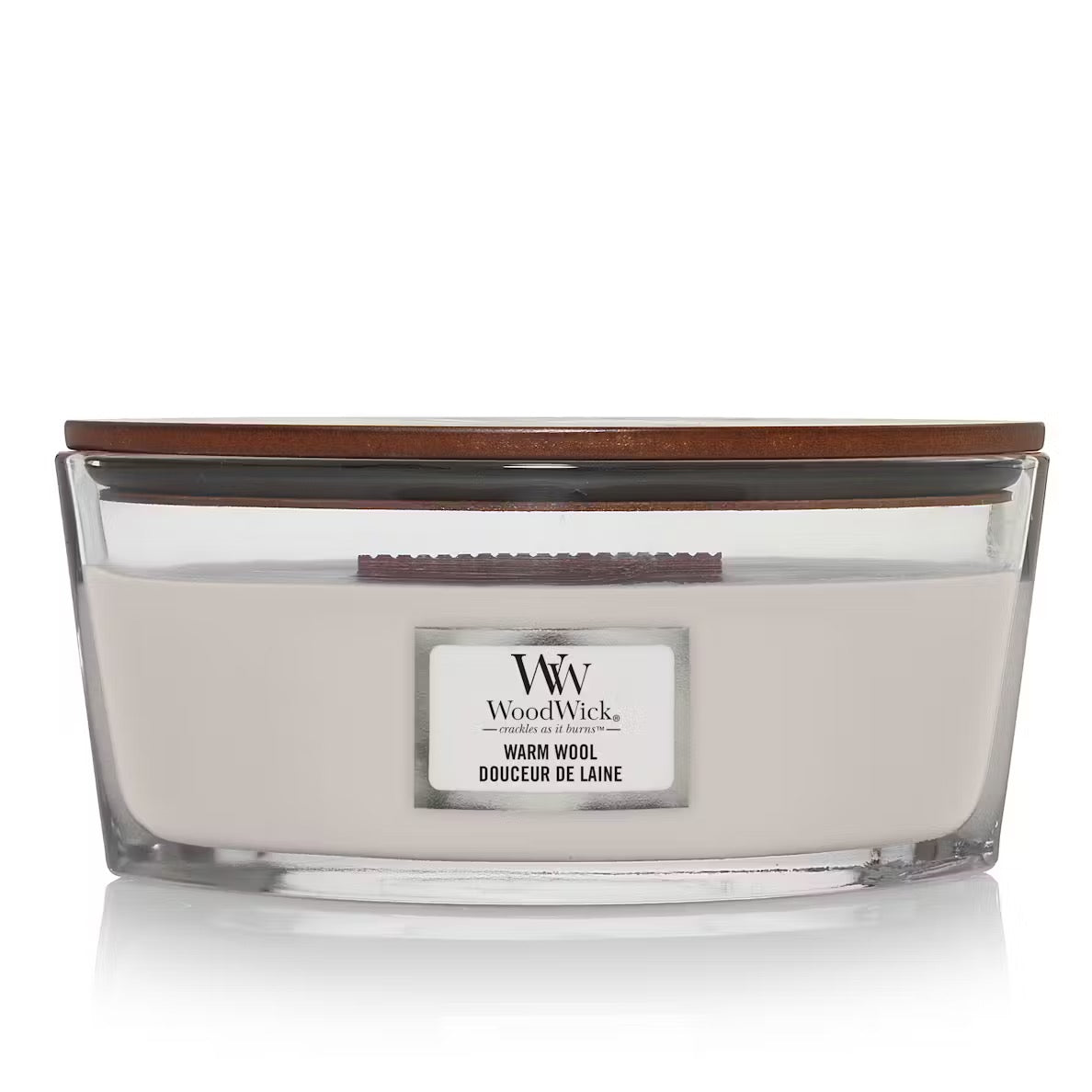 WoodWick Warm Wool Ellipse Jar Candle with cream-colored wax, a wooden wick, and a wooden lid centered against a clean white background.