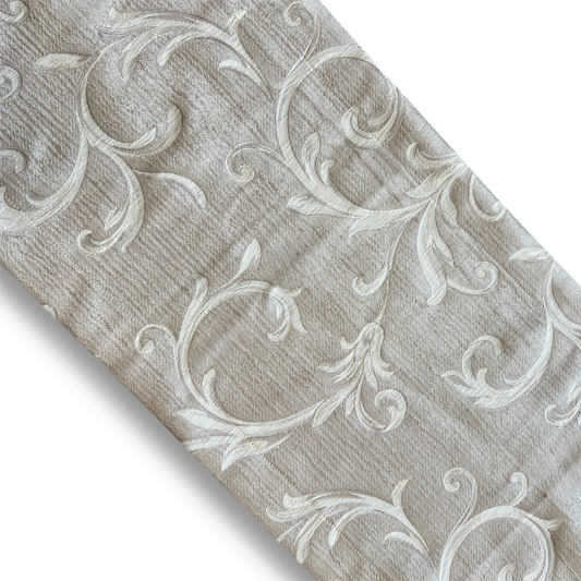 Close-up of White Floral - Golden Runner showcasing a textured, neutral background with embossed scroll and leaf motifs, highlighting its decorative elegance.