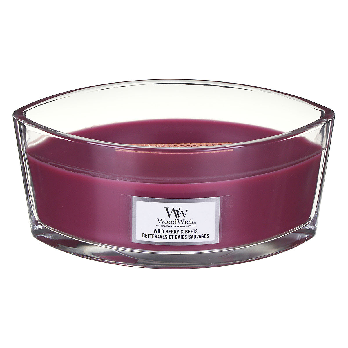 WoodWick Wild Berry and Beets candle in a clear glass jar with an open lid.