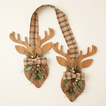 Wooden deer hanger against white off background