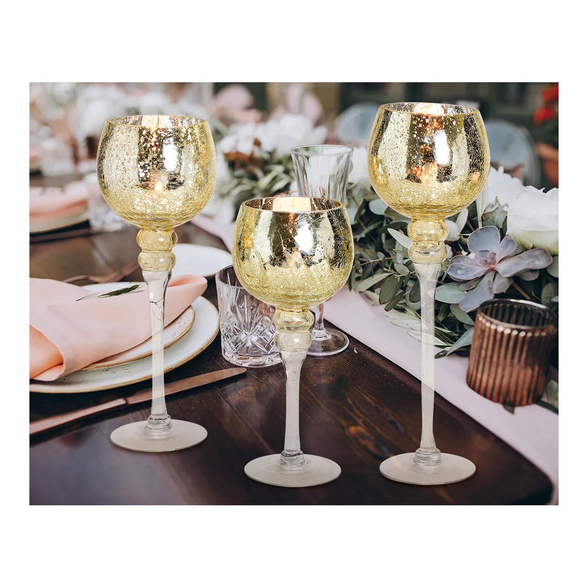 A set of three gold-colored glass windlight holders with a cracking glass texture, displayed against a white background.