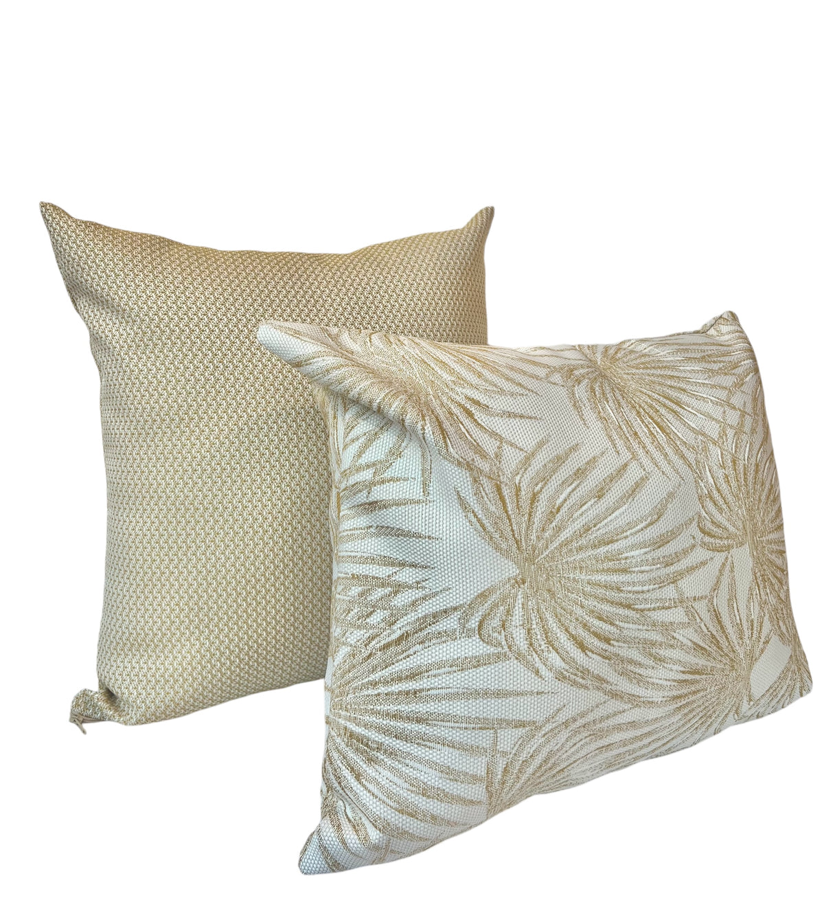 A square beige throw pillow with a textured pattern and a tropical beige pillows